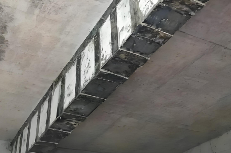 梁縱筋數(shù)量不足粘鋼加固法